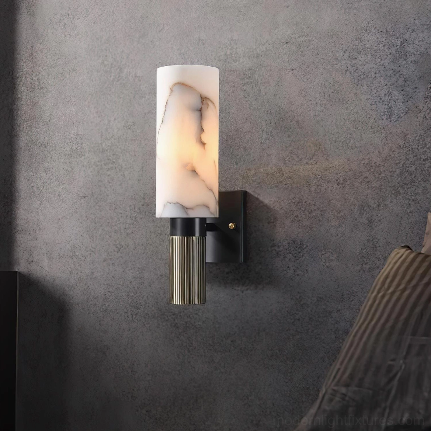 Contemporary marble wall lamp mounted in bedroom setting with warm ambient light glow