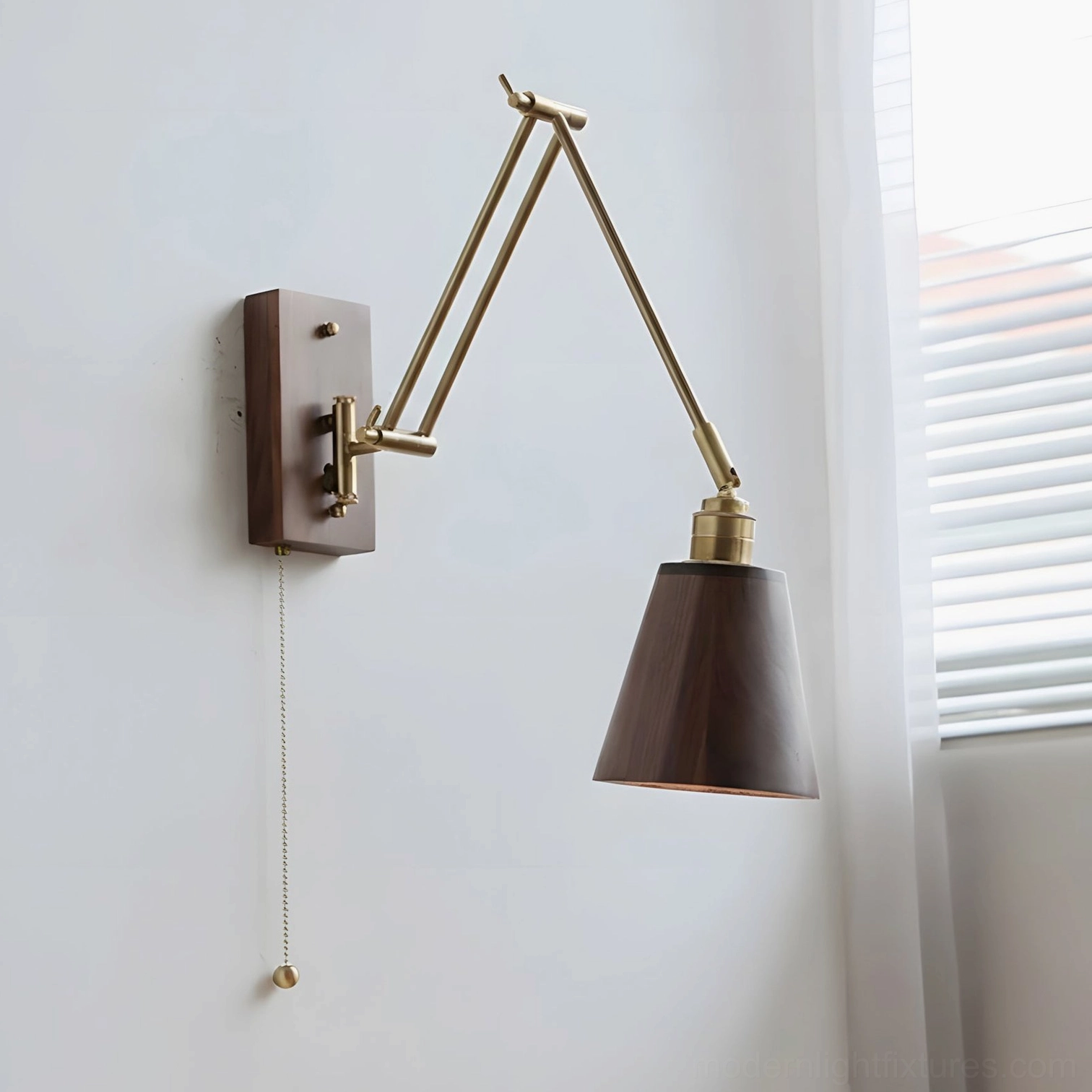 Model B adjustable wall sconce showing tapered dark wood shade with brass accents and pull chain control mechanism