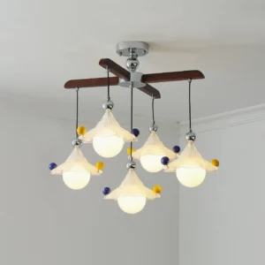 Modern five-head ceiling light fixture with decorative glass shades and mid-century wooden cross arms detail