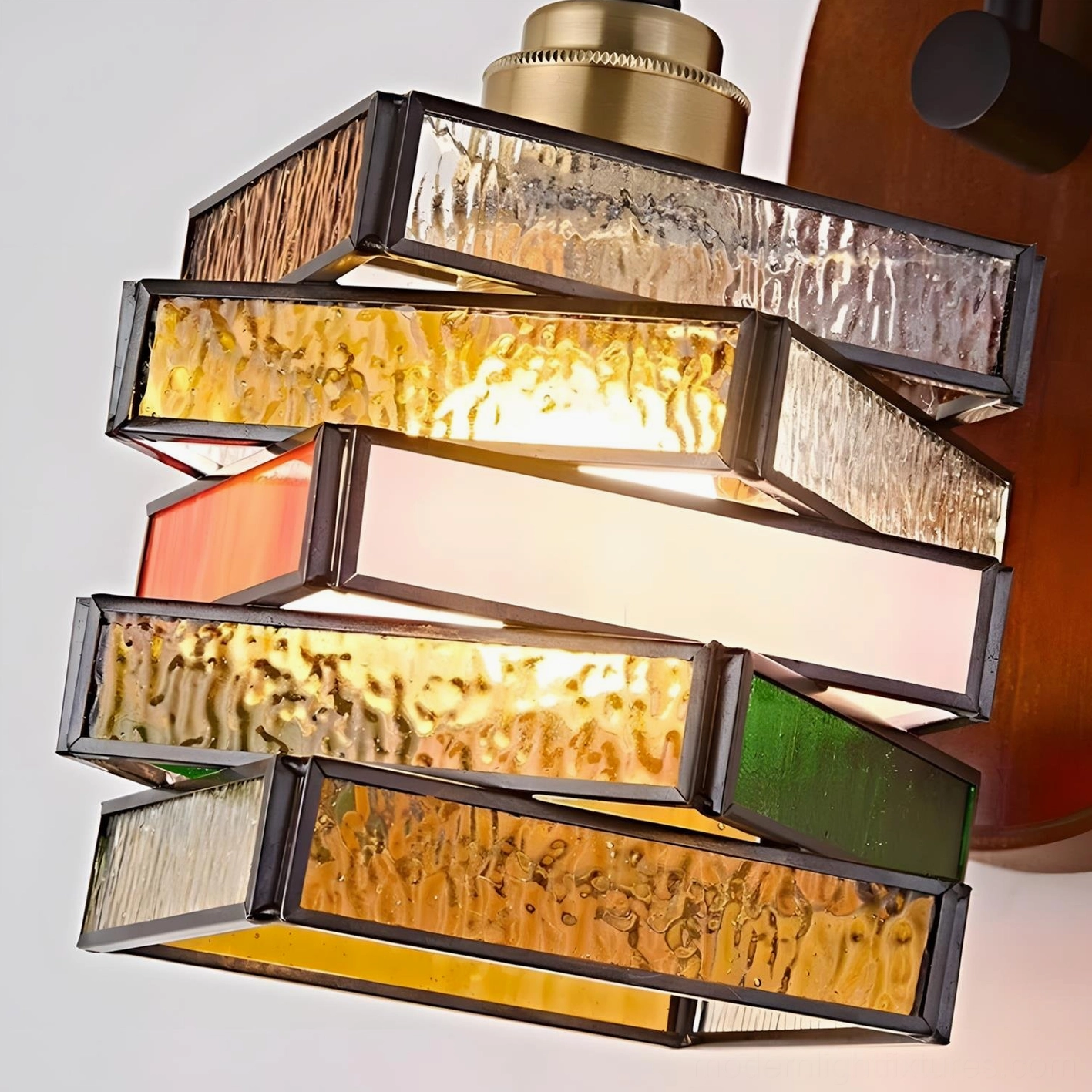 Marlowe stained glass wall sconce artistic side profile with black metal arm and multicolor glass panels