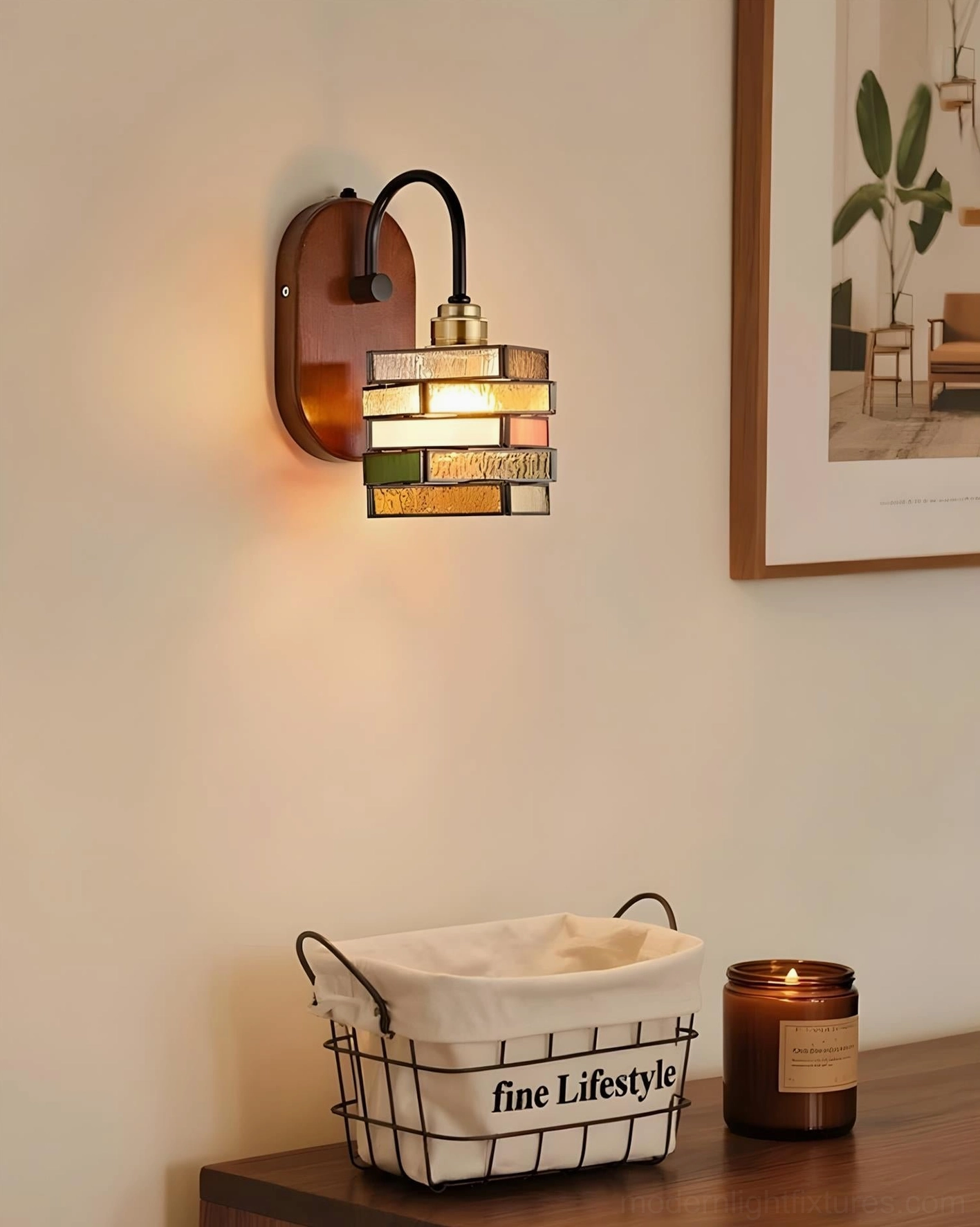 Bedroom dresser area with Marlowe wall sconce providing warm ambient light above storage basket and candle