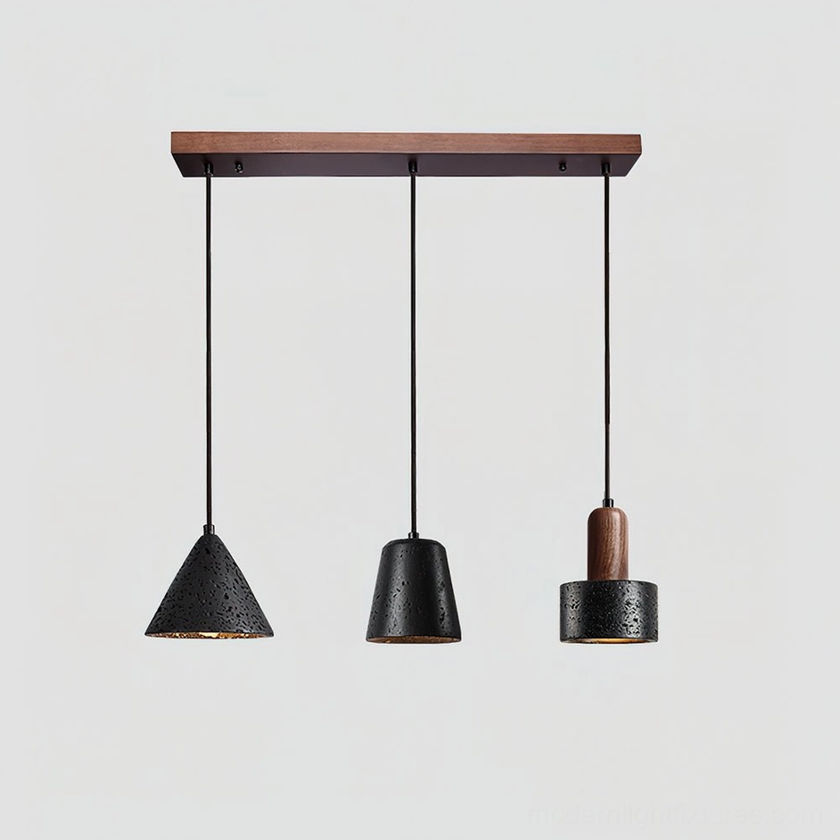 Model G sculptural pendant light fixture with mixed shade geometries and travertine material