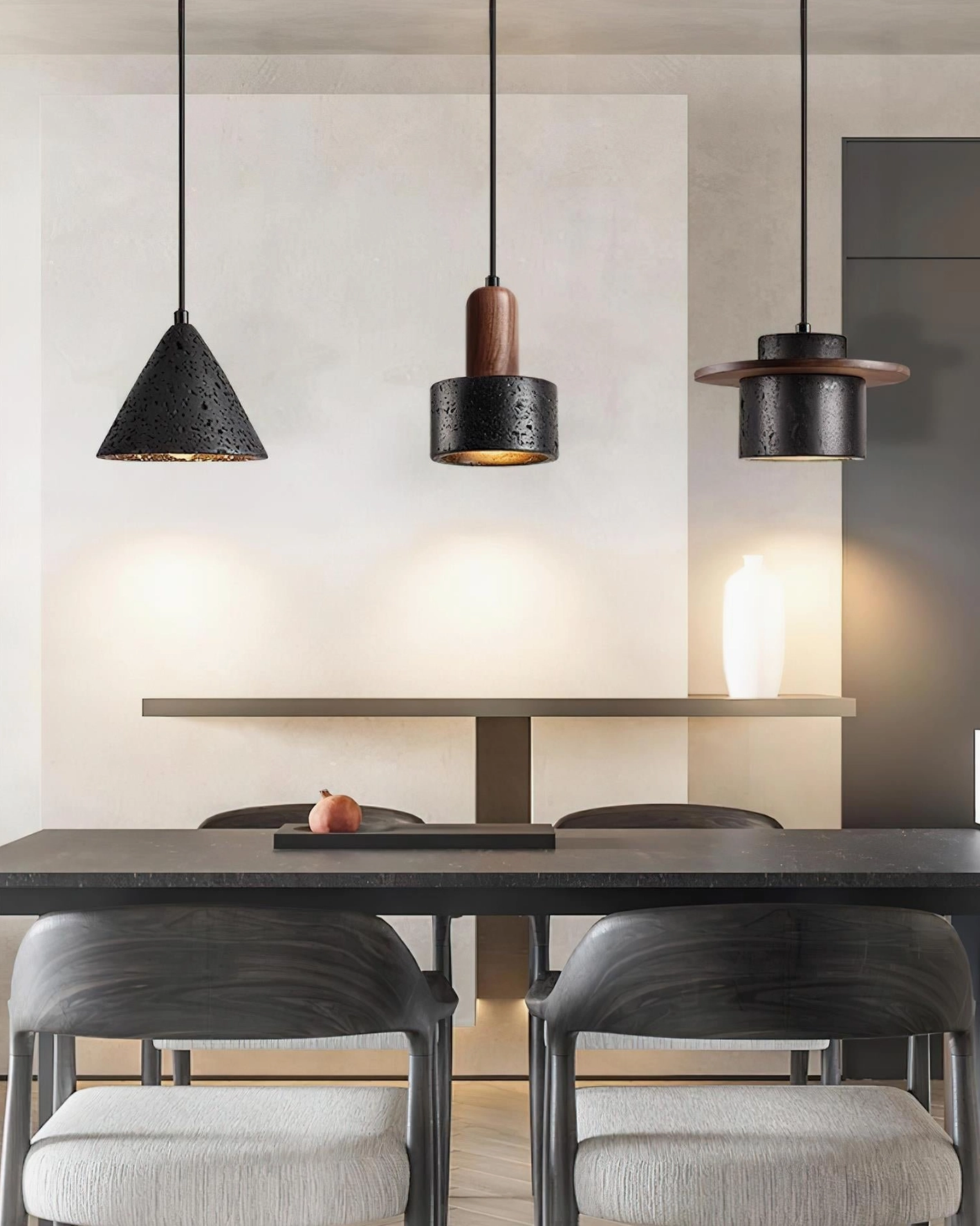 Modern dining pendant lights in warm walnut and black finish above contemporary table setting