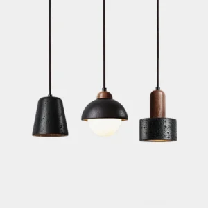 Marnox modern pendant light cluster featuring three sculptural shades in travertine and walnut wood on white background
