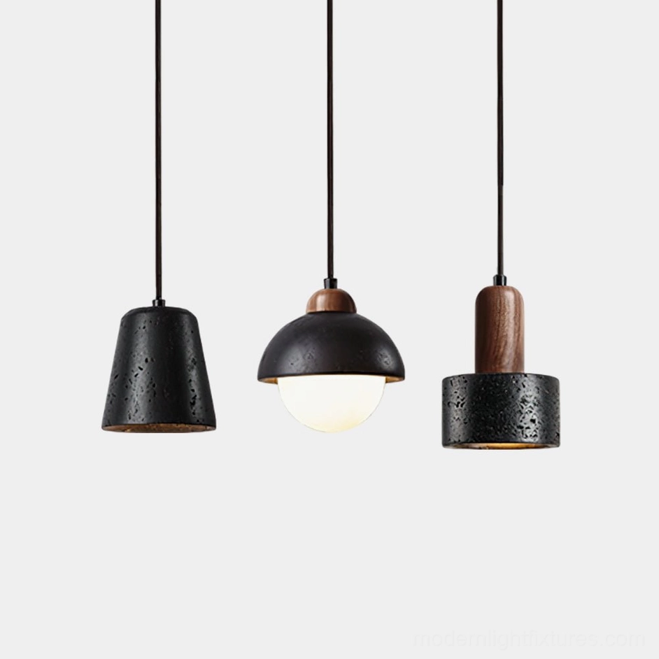 Marnox modern pendant light cluster featuring three sculptural shades in travertine and walnut wood on white background