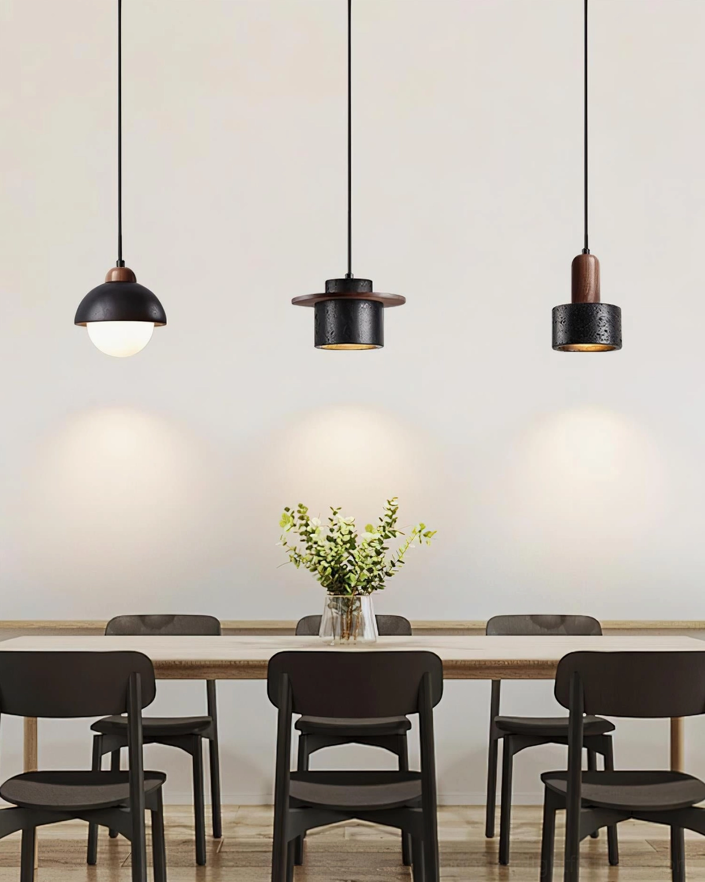 Sculptural pendant light fixture combining natural travertine with contemporary minimalist design