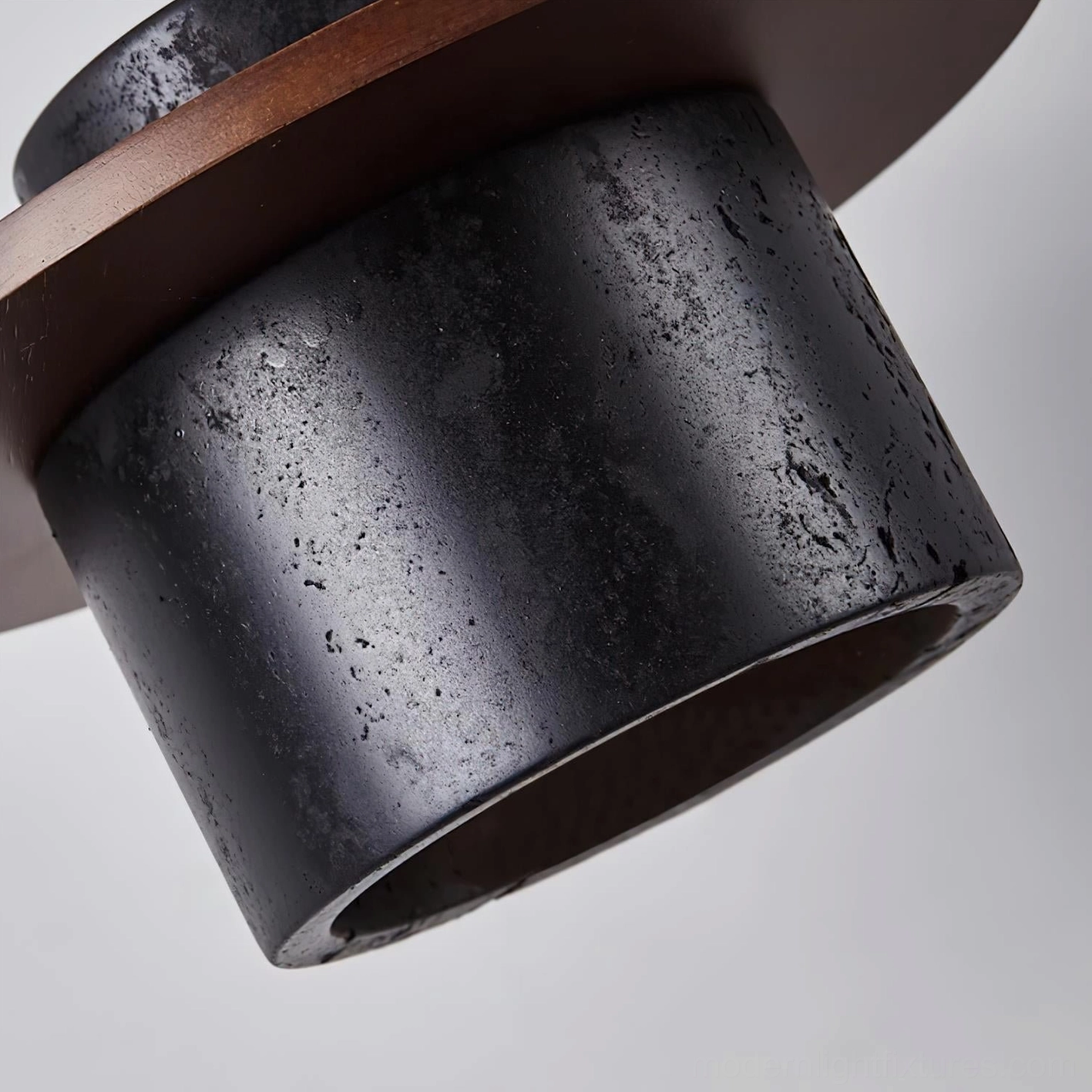 Marnox travertine pendant light showing natural stone characteristics and artisanal finish quality