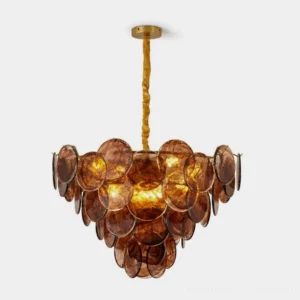 Marova tiered glass disc chandelier in smoky brown with Antique Brass frame, front view on white background