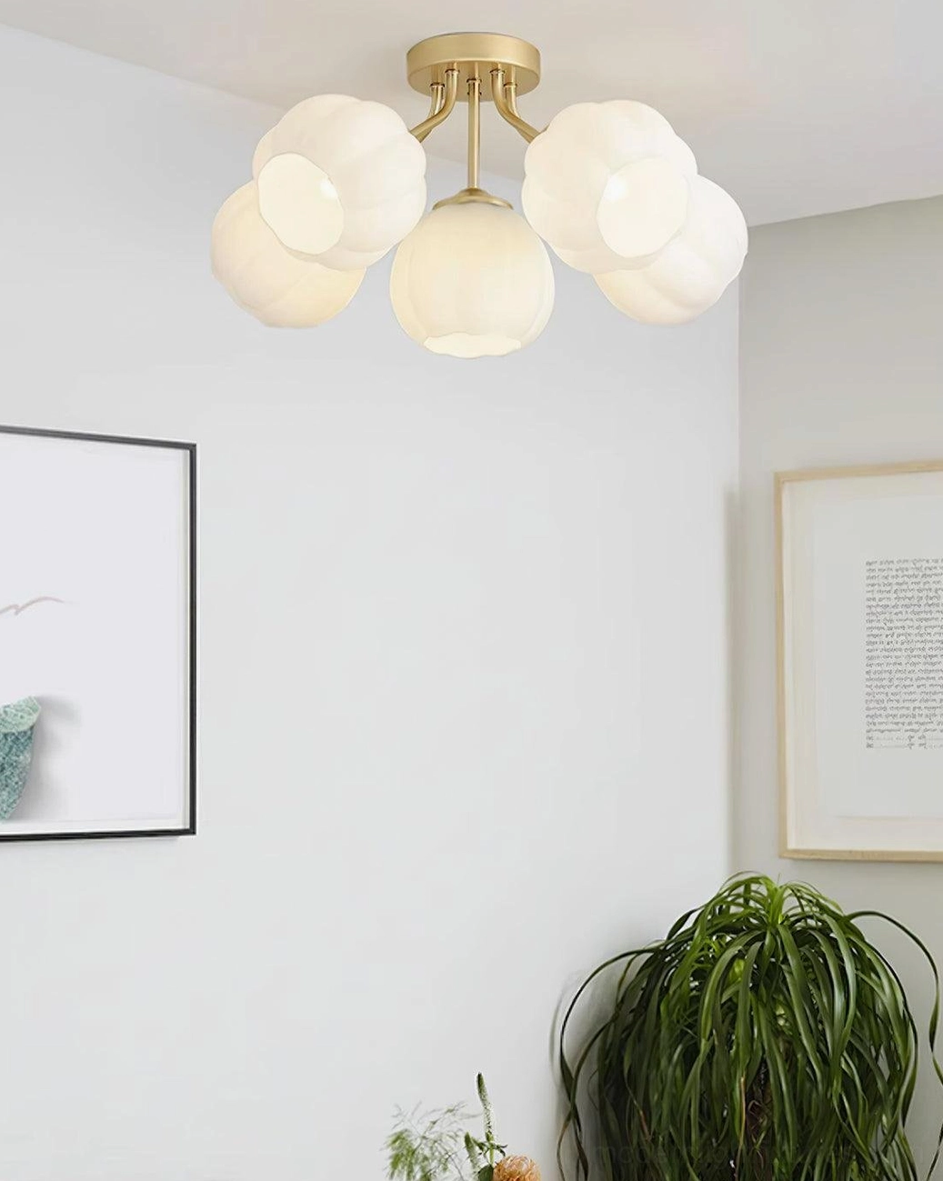 Marra multi-head floral ceiling light demonstrating warm ambient light diffusion through frosted white glass shades
