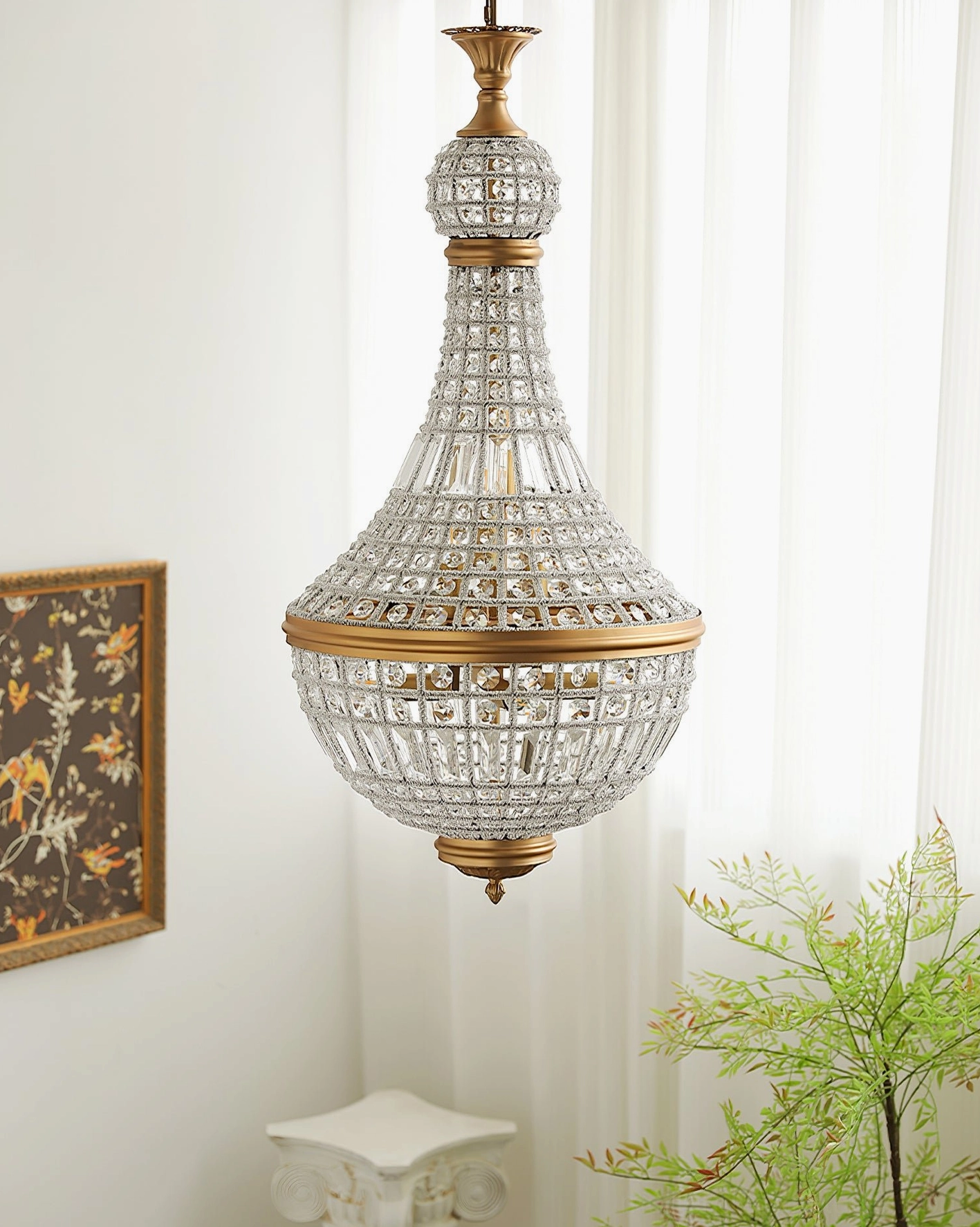 Marrakech silver crystal empire chandelier side angle in sunlit residential space