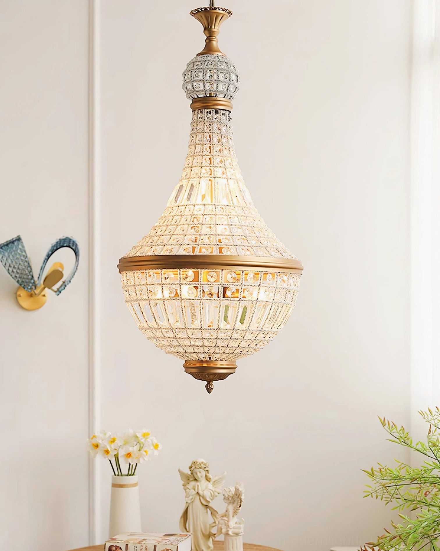 Marrakech crystal pendant light three-quarter view in home decor setting with wall art