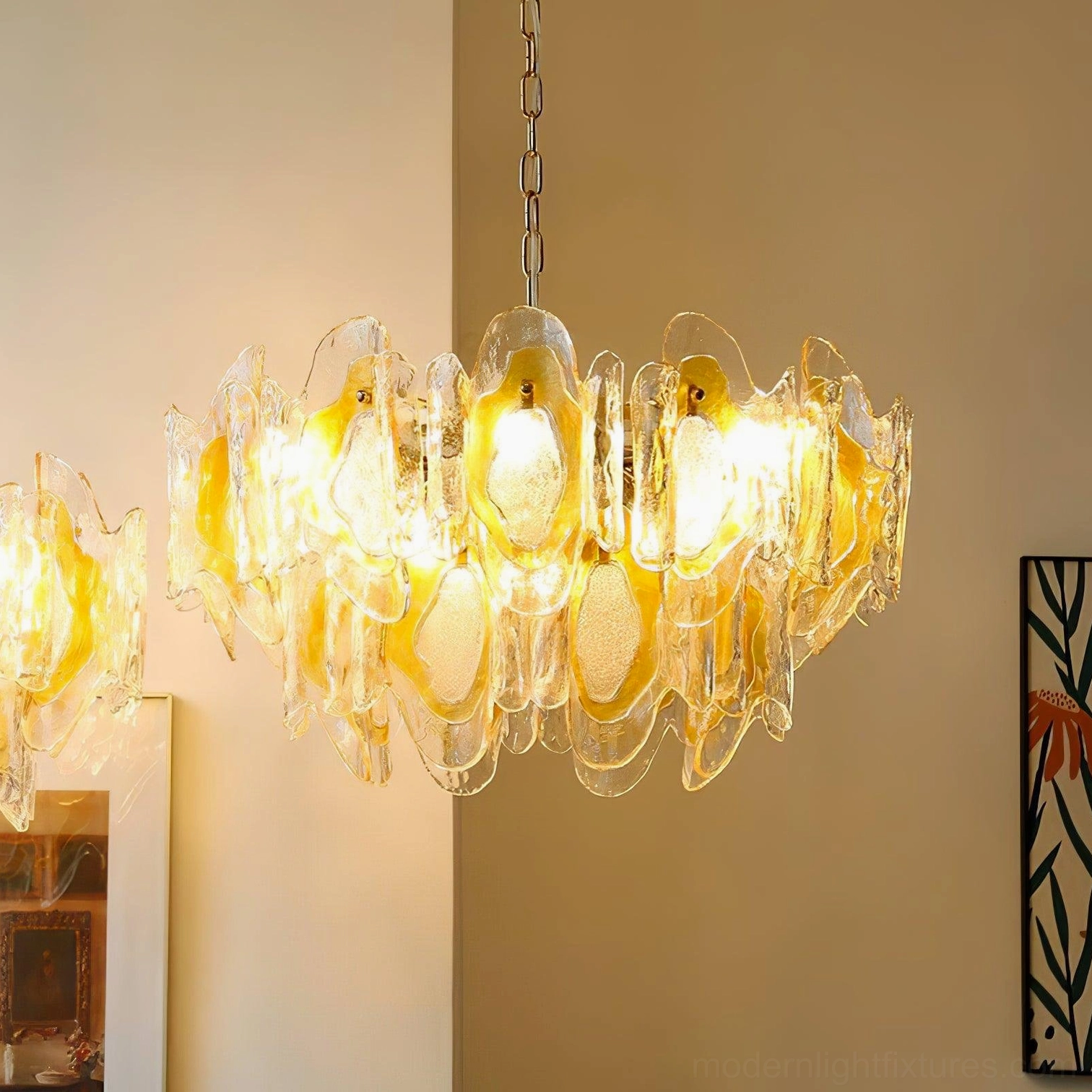 Large vintage glass chandelier with multi-layered amber hand-blown shades and brass hardware, oblique residential interior