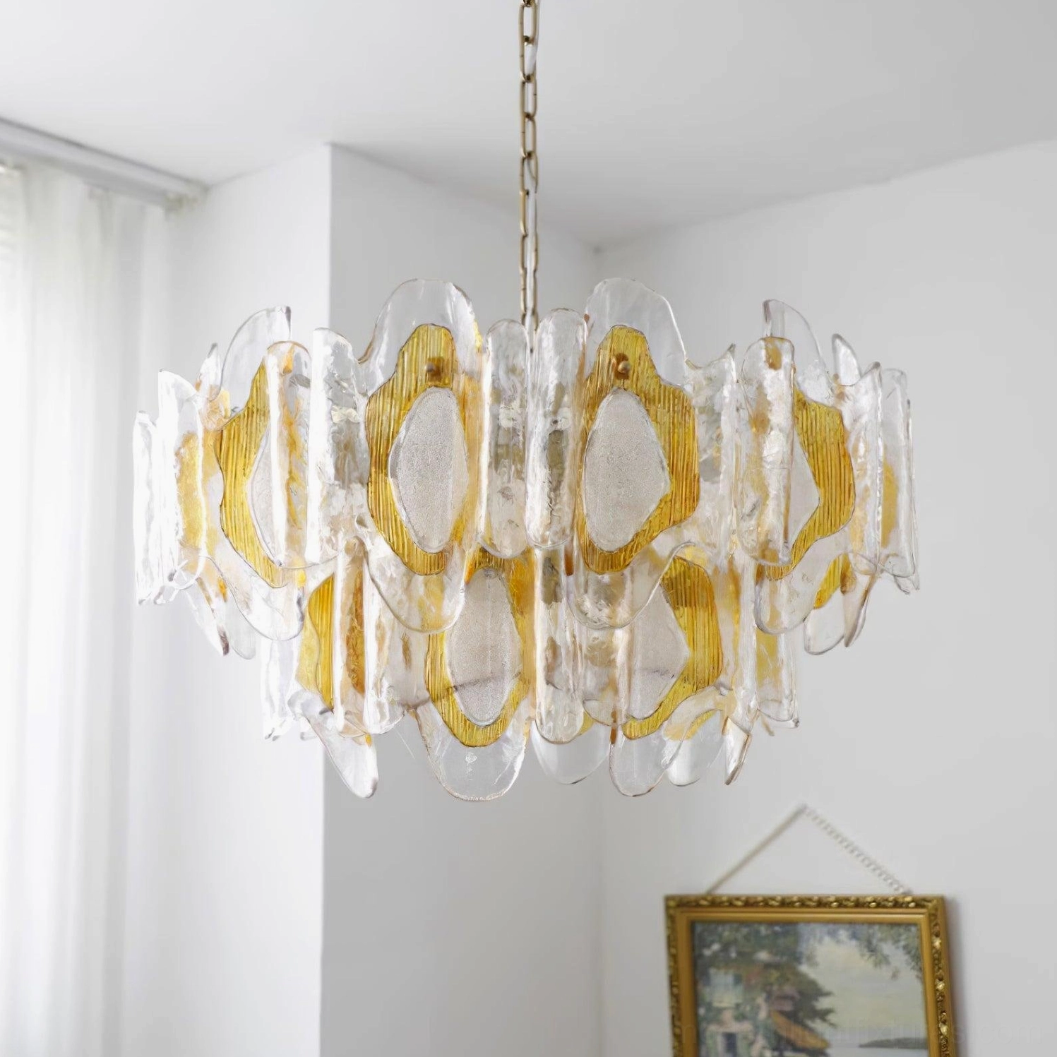 Vintage glass chandelier with hand-blown shades suspended by adjustable brass chain