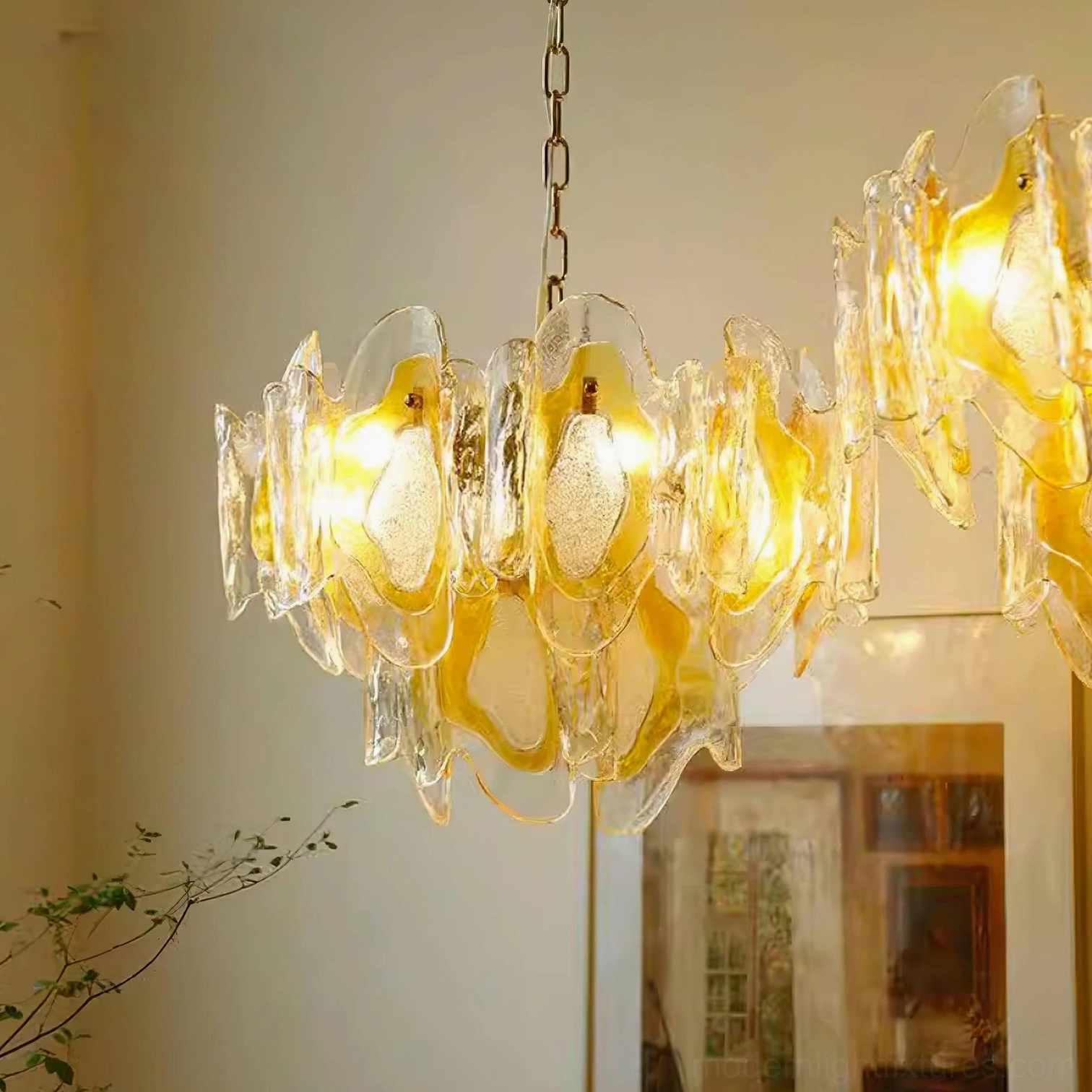 Vintage glass chandelier with multiple E14 socket configuration and warm amber illumination