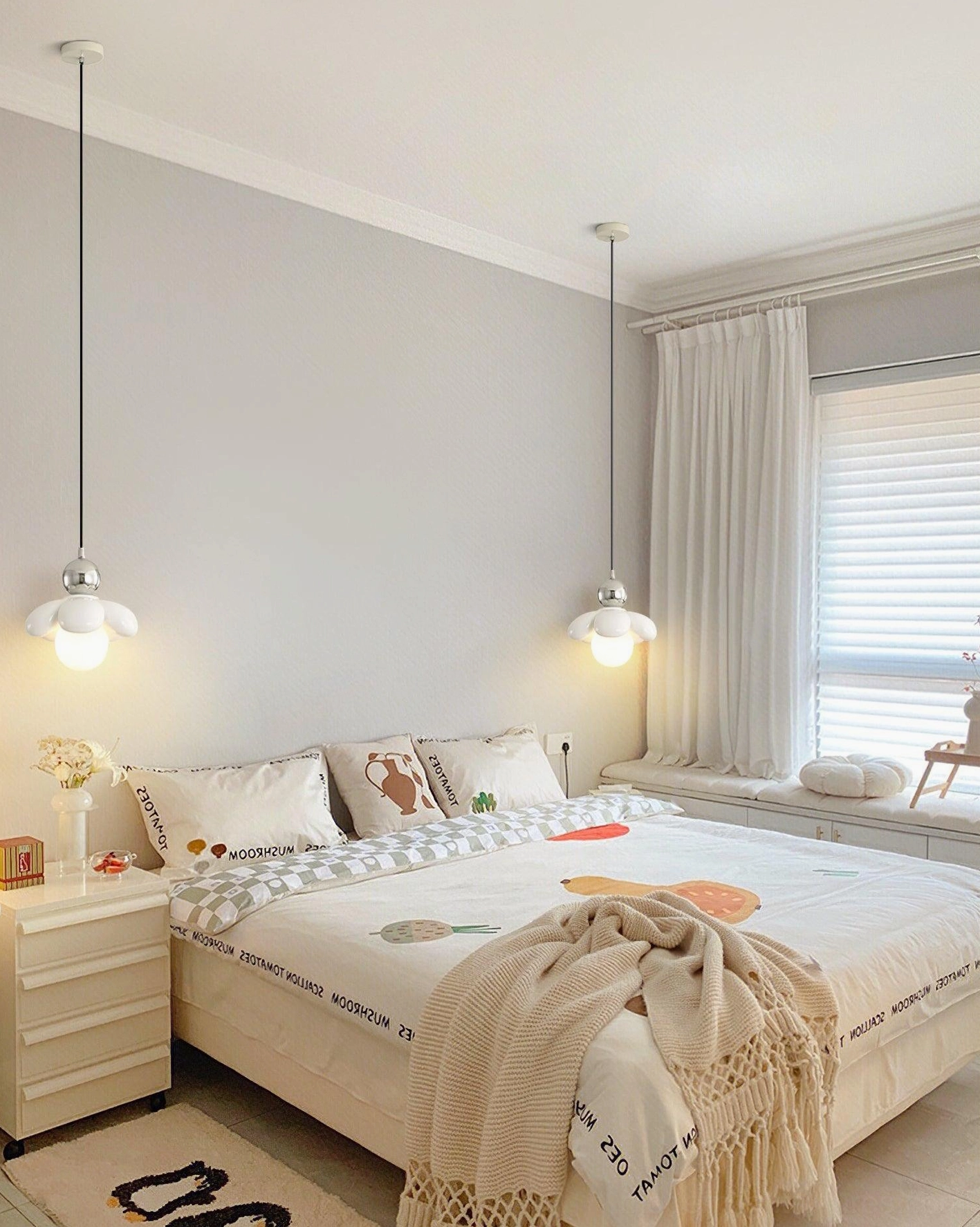 Two Maru Flower Pendant Lights hanging above modern bedroom nightstands