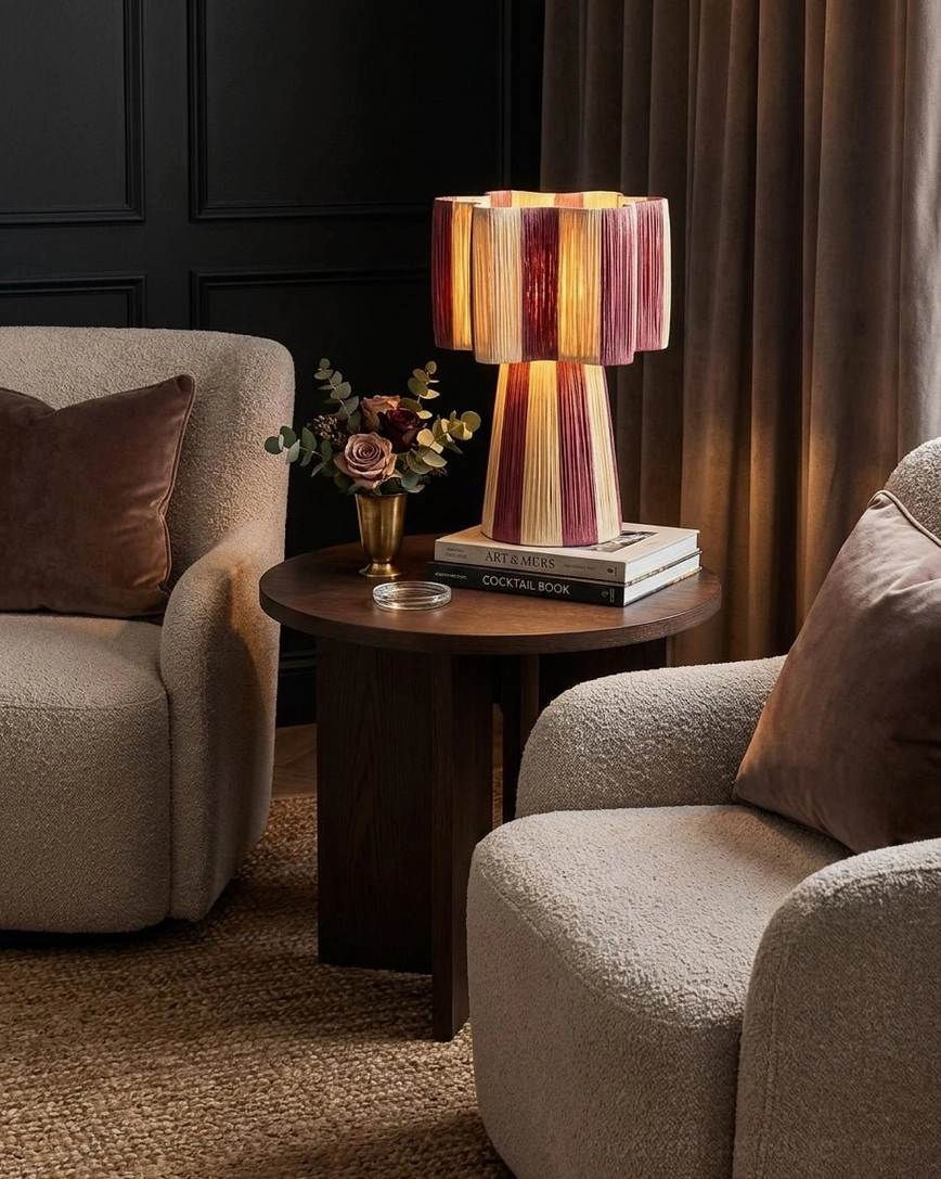 Maruvia boho table lamp lit up with warm glow showing light diffusion through cotton-cord shade, evening ambiance