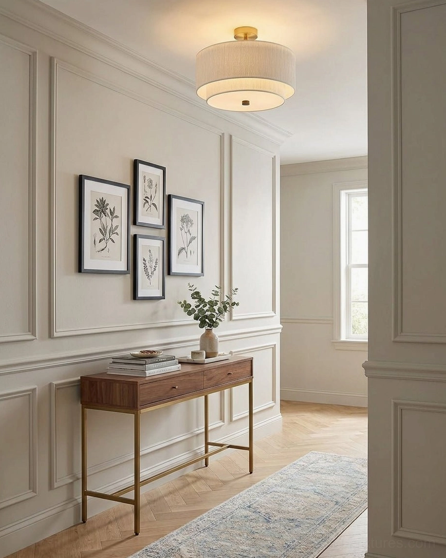 Marvelle two-tier drum semi-flush ceiling light in minimalist hallway corridor with wall art prints and paneled neutral decor