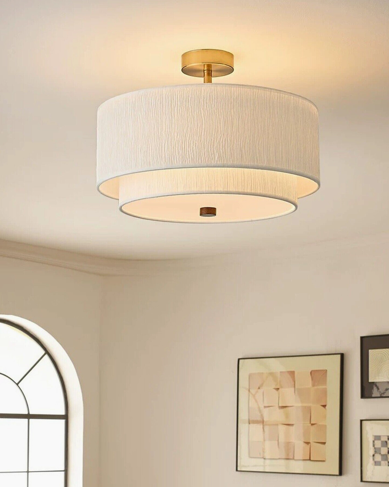 Marvelle rice paper drum ceiling fixture detail showing brass-tone metal frame, wood center finial, bottom diffuser disc, and E27 socket configuration