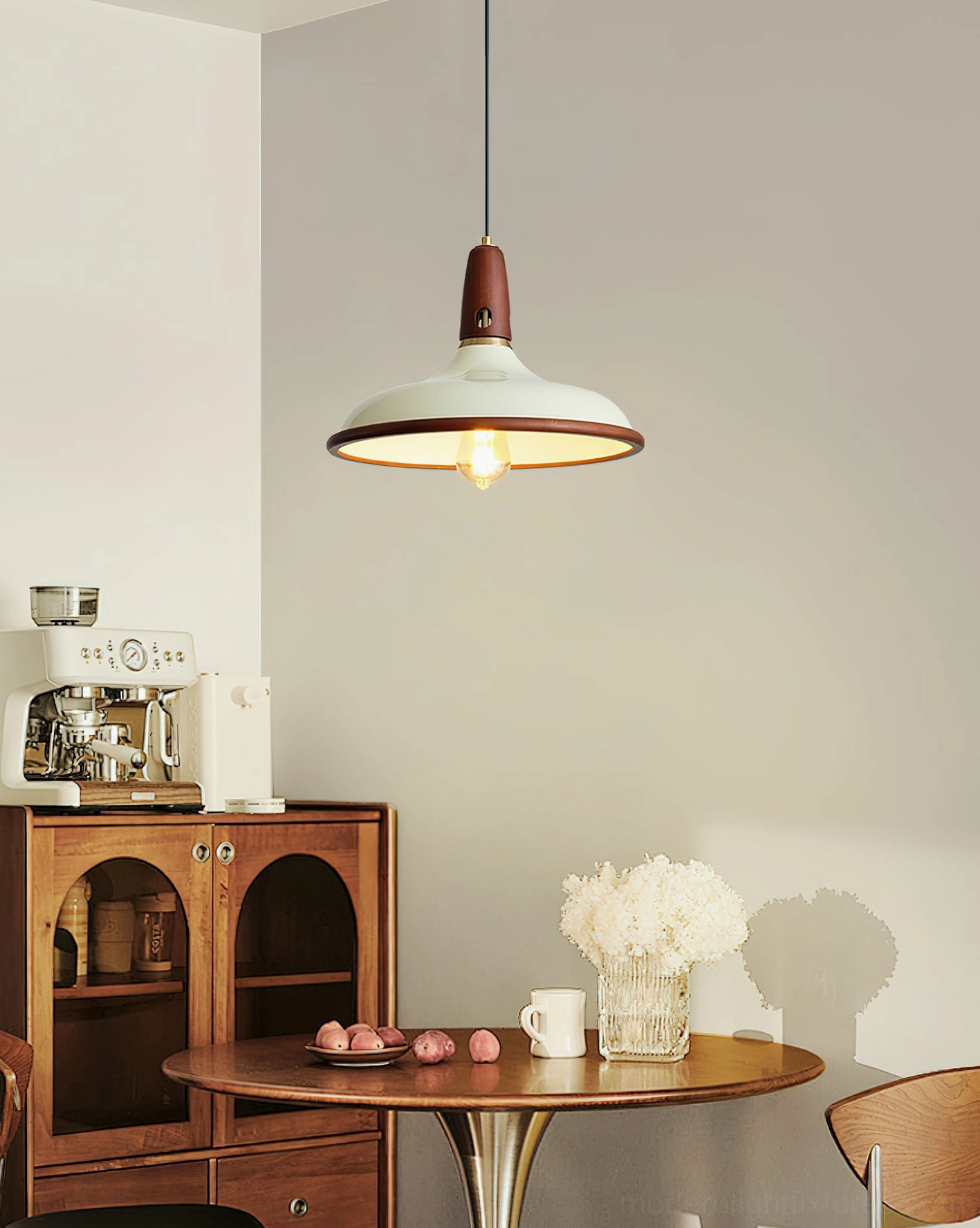 Retro pendant lamp in dining nook with coffee station warm vintage aesthetic two-tone design