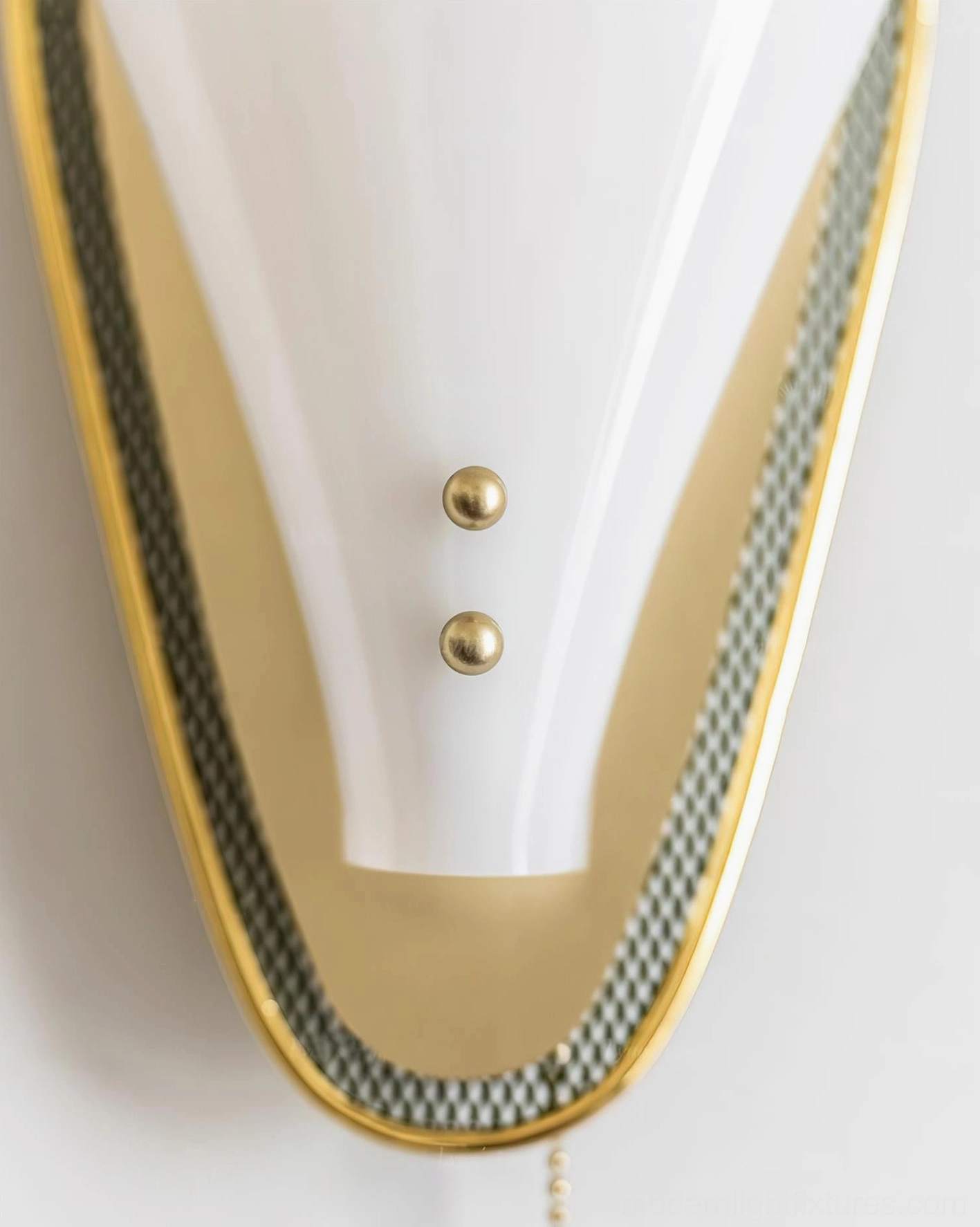 Marzio wall sconce unlit close-up detail showing tapered shade brass frame and pull chain switch mechanism
