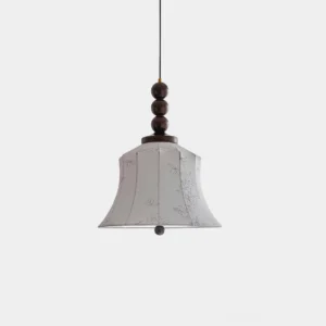 Materia fabric pendant light with walnut beaded stem and cream bell shade, front view on white background