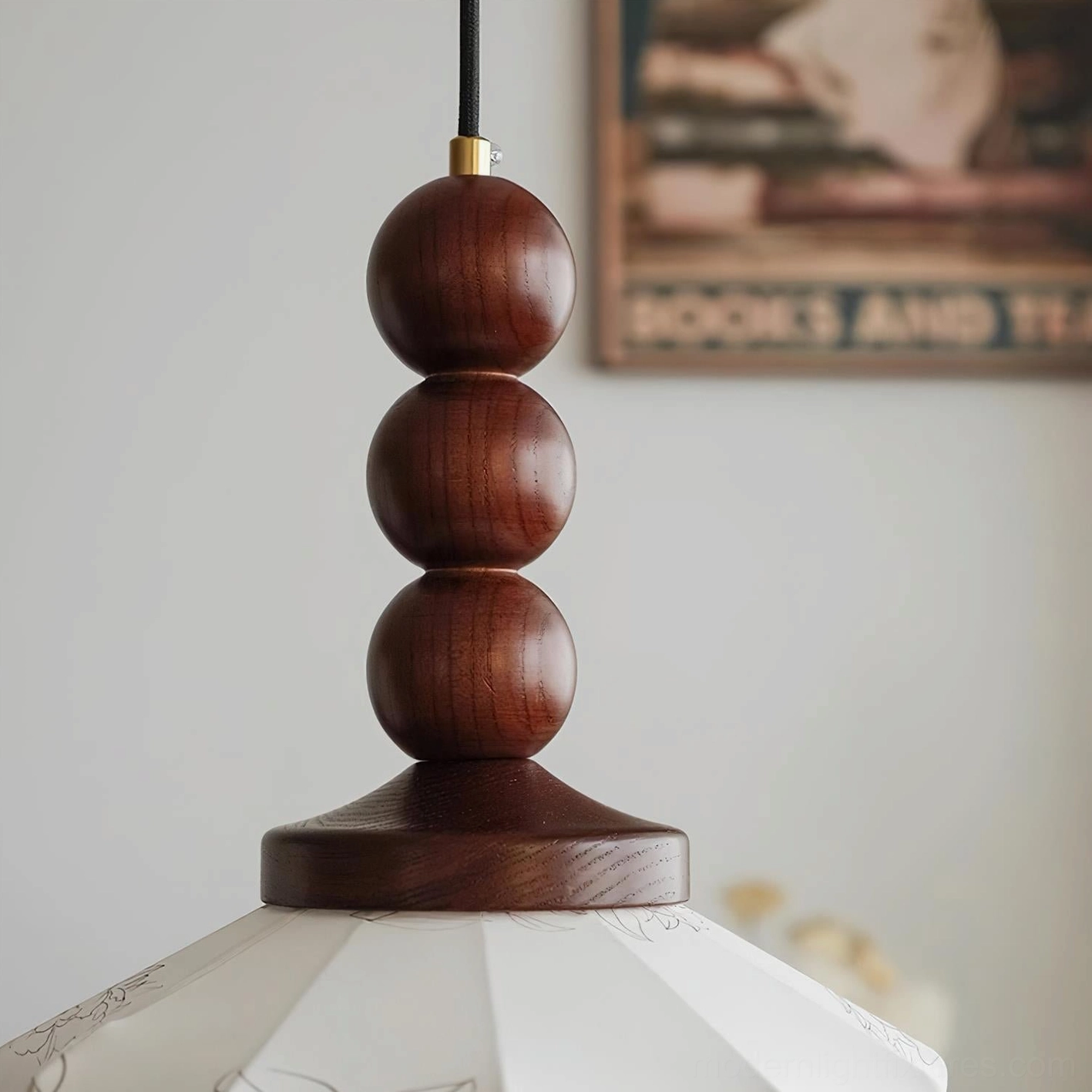 Materia pendant lamp installed in mid-century modern dining room with vintage aesthetic and warm lighting