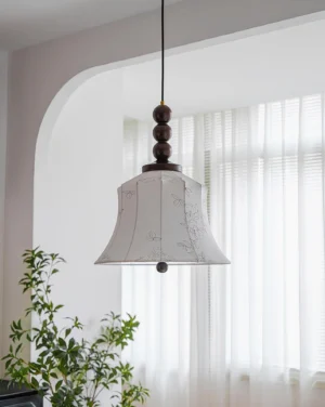 Materia hanging pendant lamp in minimalist interior with arched doorway, showing warm ambient lighting