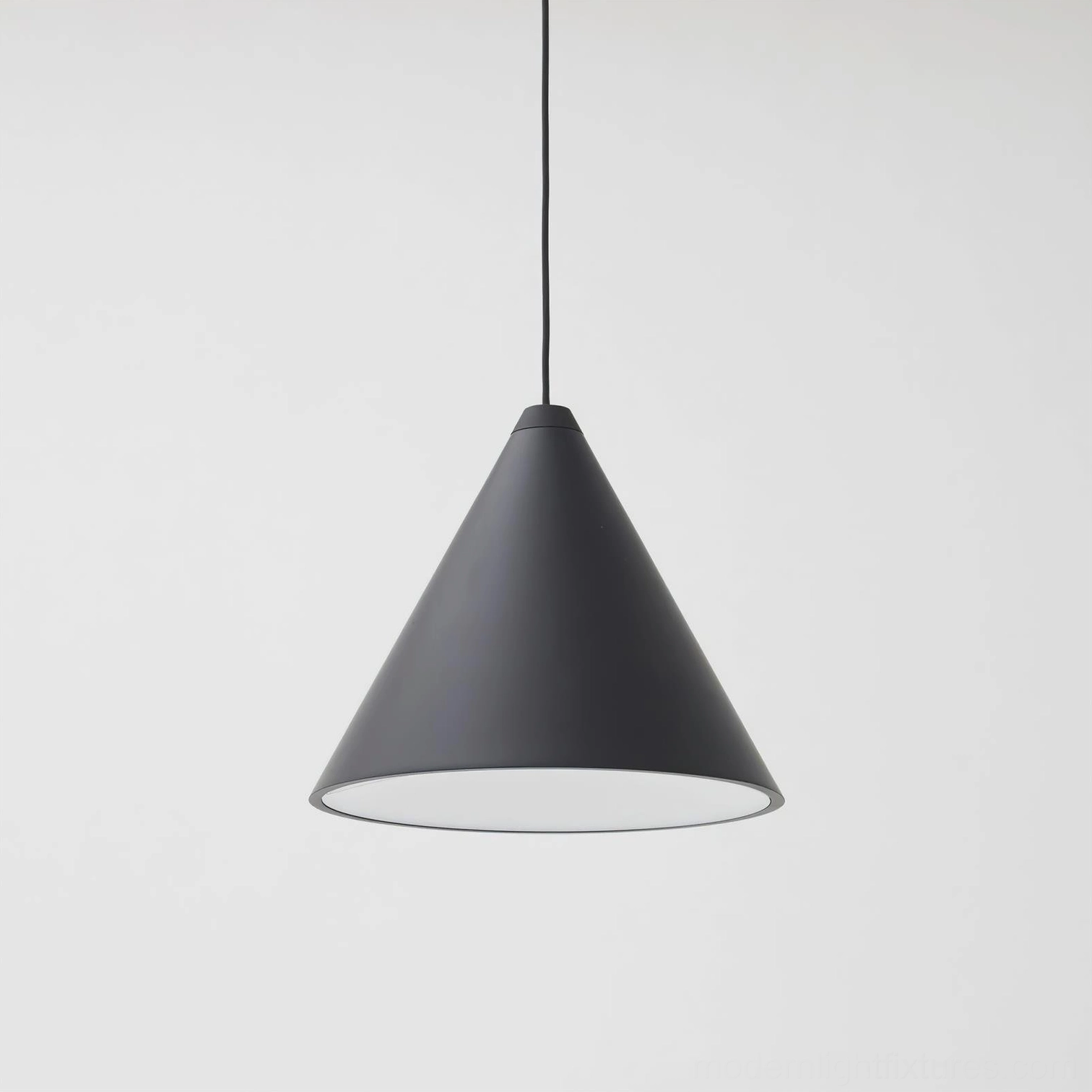 Matte black metal cone pendant light with exposed cable, minimalist Nordic design studio product photography