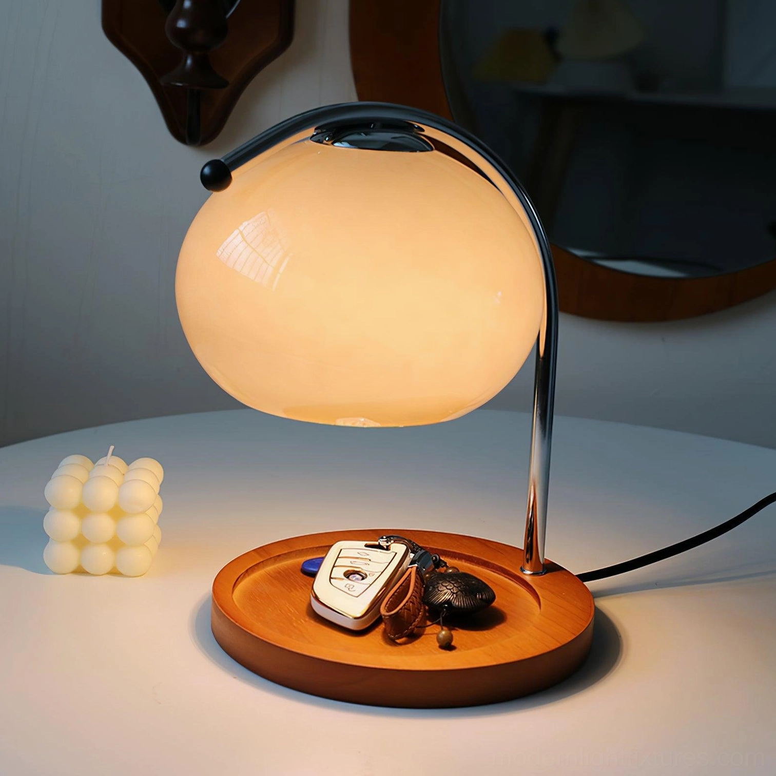 Mauri halogen candle warmer lamp showing glass body construction and solid wood base materials