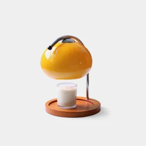 Mauri halogen candle warmer lamp with yellow shade and wooden base on white background, front view