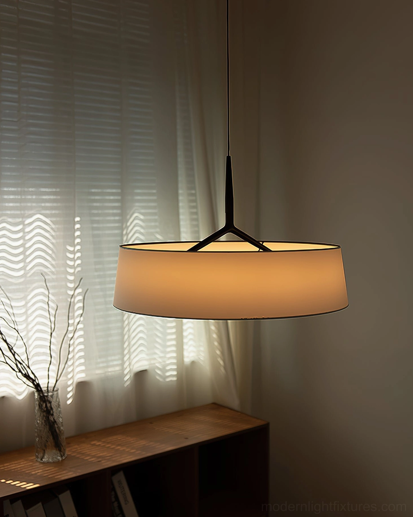 Maxim pendant lamp with beige fabric shade in residential side table nook, side low-angle view