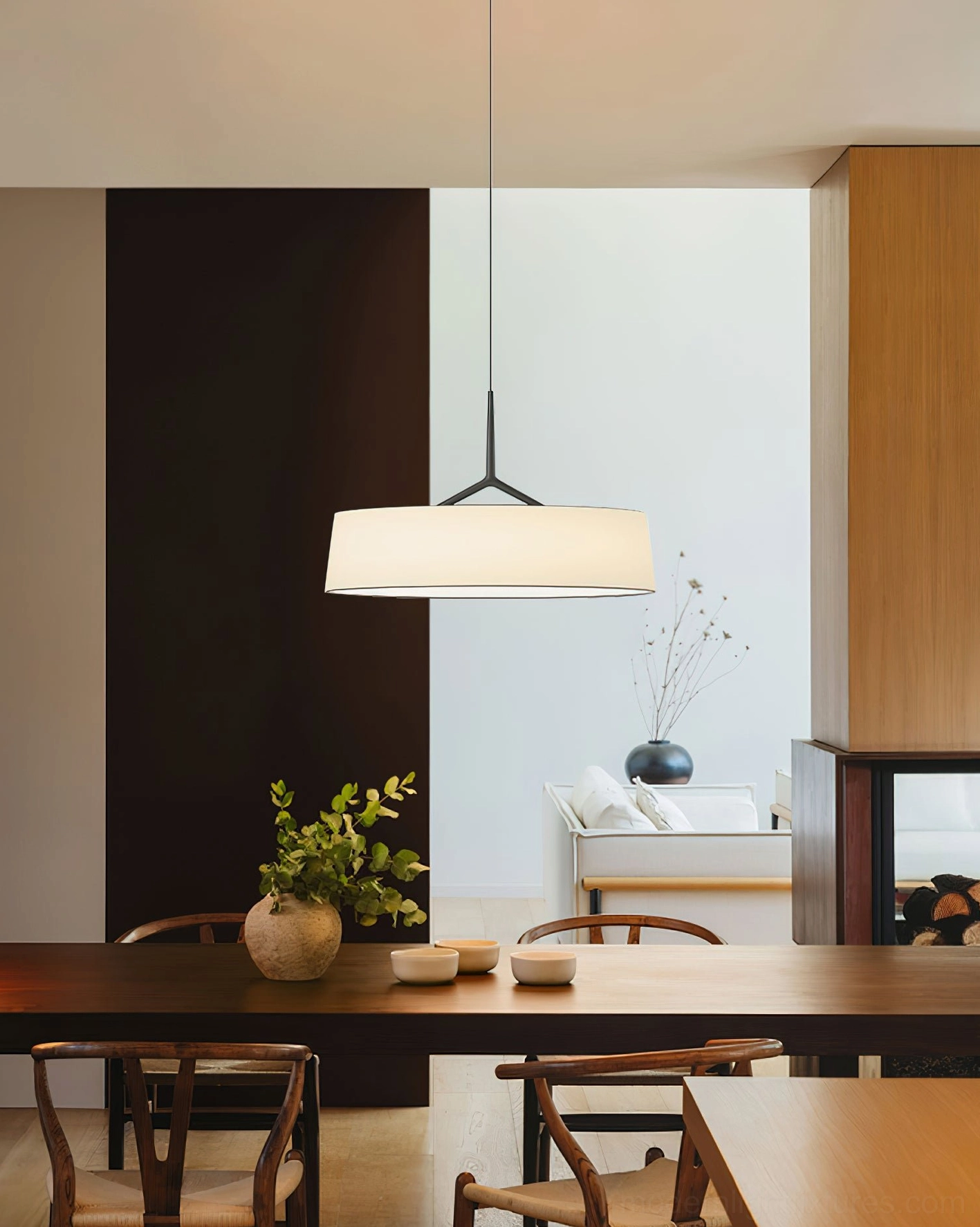 Maxim pendant light suspended over modern dining table with warm 3000K LED lighting