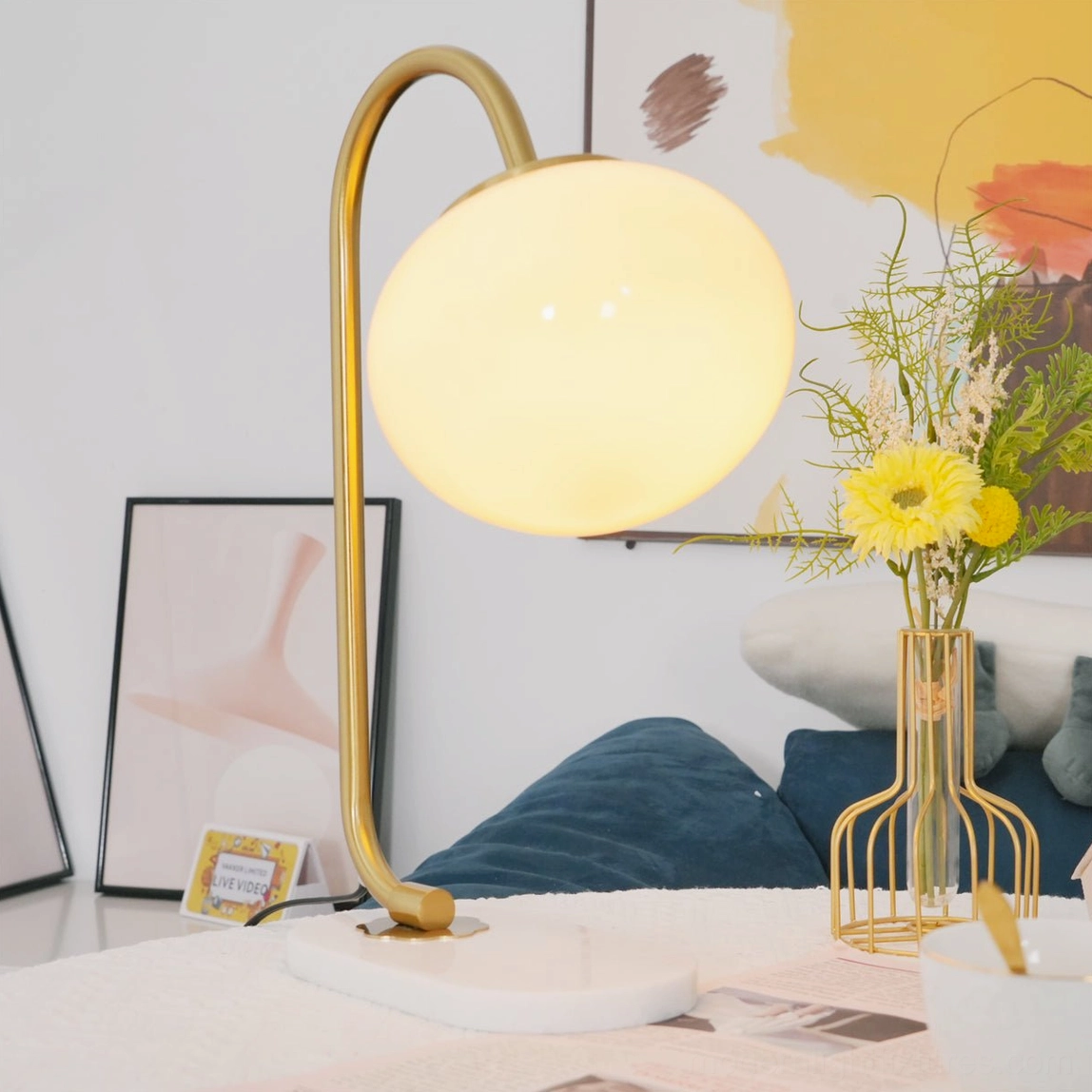 Maximalist interior design featuring statement globe table lamp with bold color shade