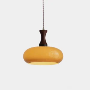 Mayon antique brown glass cylinder pendant light, front view in warm studio lighting, mid-century modern design