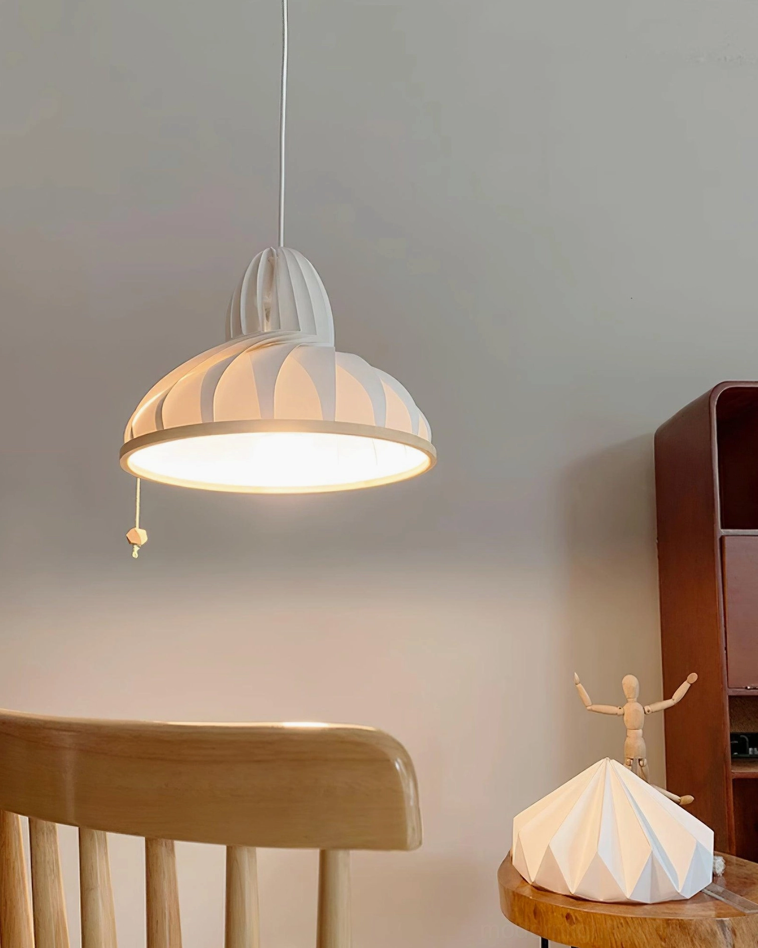 Meblo modern wave pendant light fixture with wooden base component and fabric shade assembly ready for installation