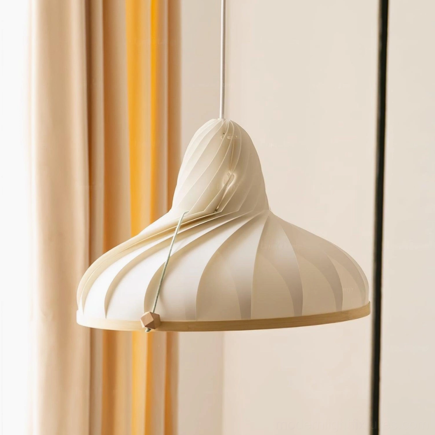Meblo wave pendant light hanging fixture styled in Nordic interior design setting demonstrating ambient lighting capabilities