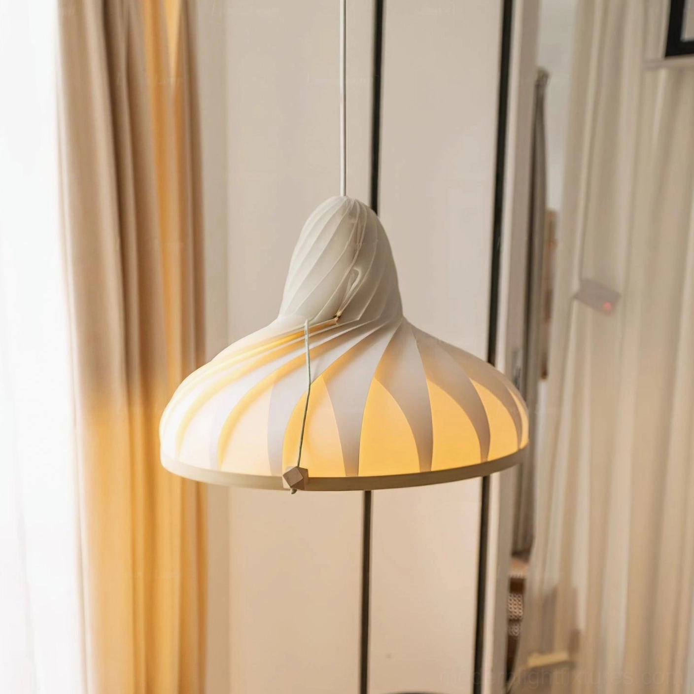 Meblo wave pendant light in Scandinavian minimalist style interior showing integration with contemporary home furnishings