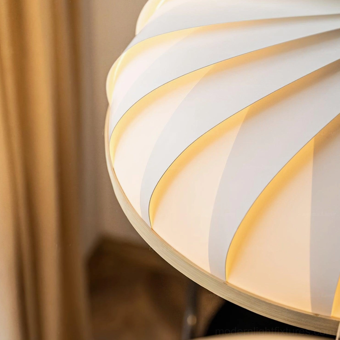 Meblo wave pendant light in home setting demonstrating how ribbed texture creates dynamic shadow patterns and visual interest
