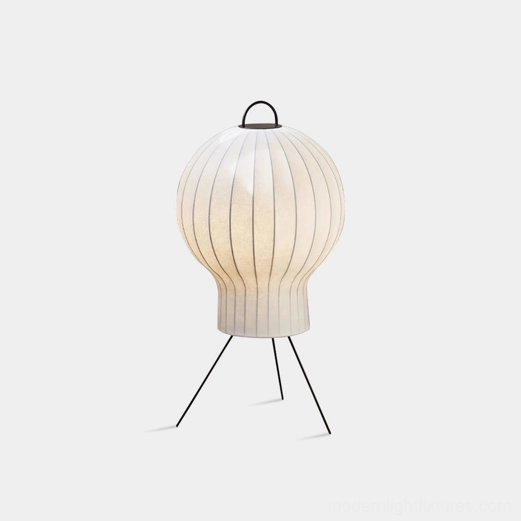 Medieval silk floor lamp with ribbed shade and black metal tripod stand, front studio view