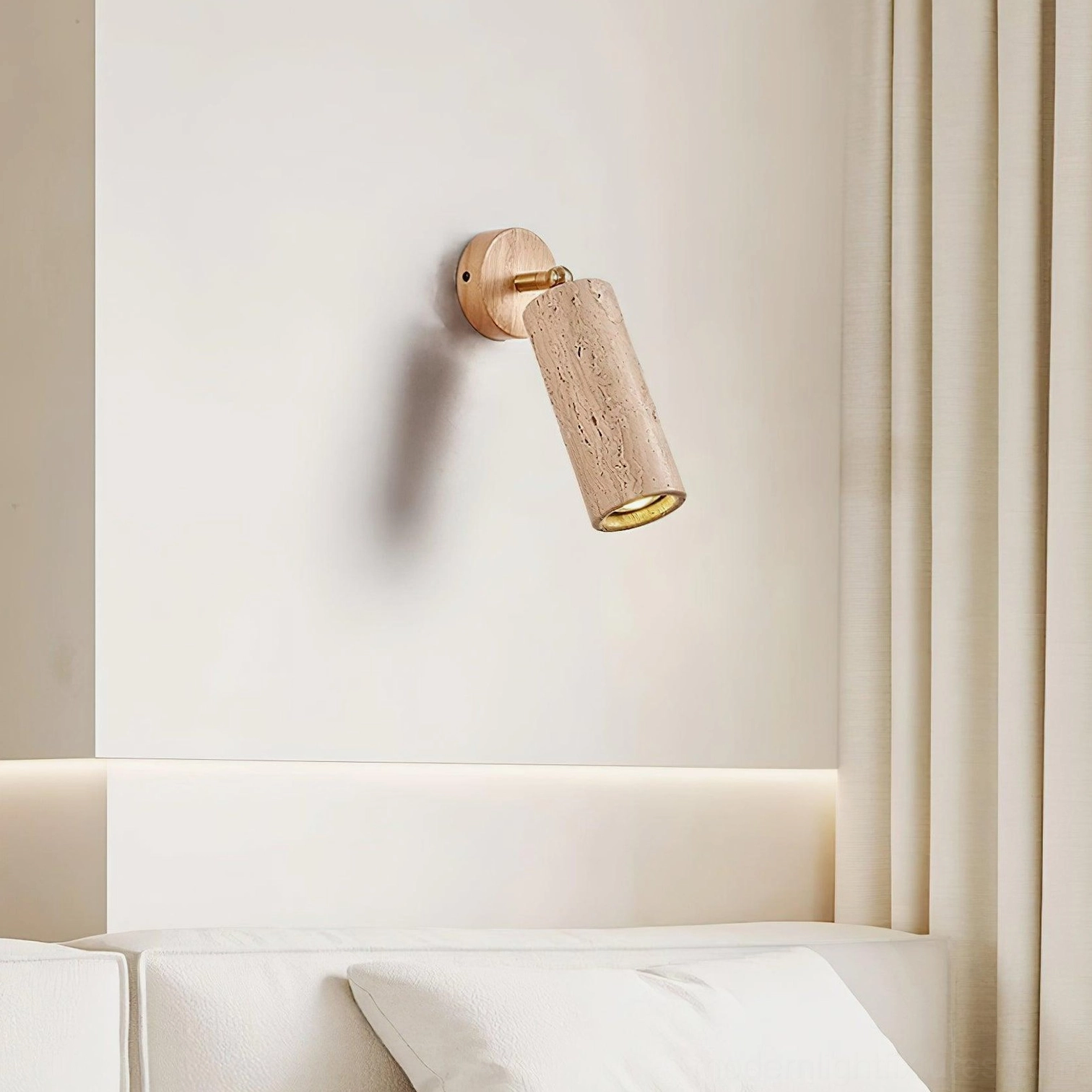 Mireille travertine wall sconce integrated into transitional interior design with mediterranean influences