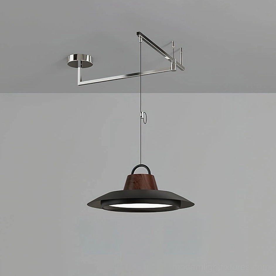 Medium black swing arm pendant light fixture in modern dining area warm white LED