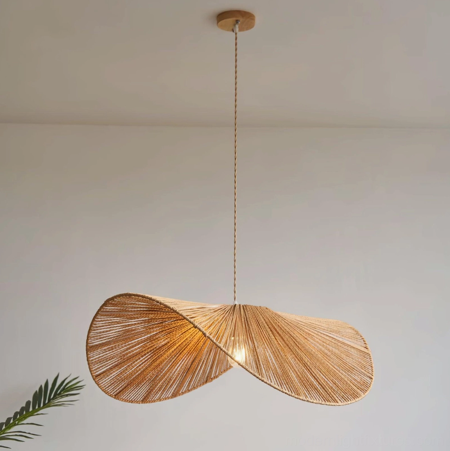 Medium size brown hemp rope straw hat pendant light installation in neutral color palette dining room