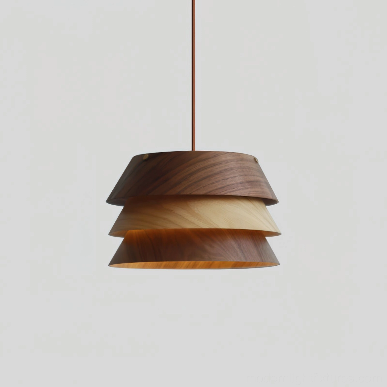 Medium tiered pendant light Model H with brass hardware details in modern industrial interior design