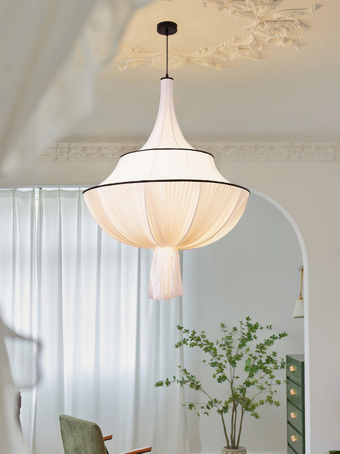 Meduse pendant light detail showing fabric pleats and black trim, artistic lighting fixture close-up