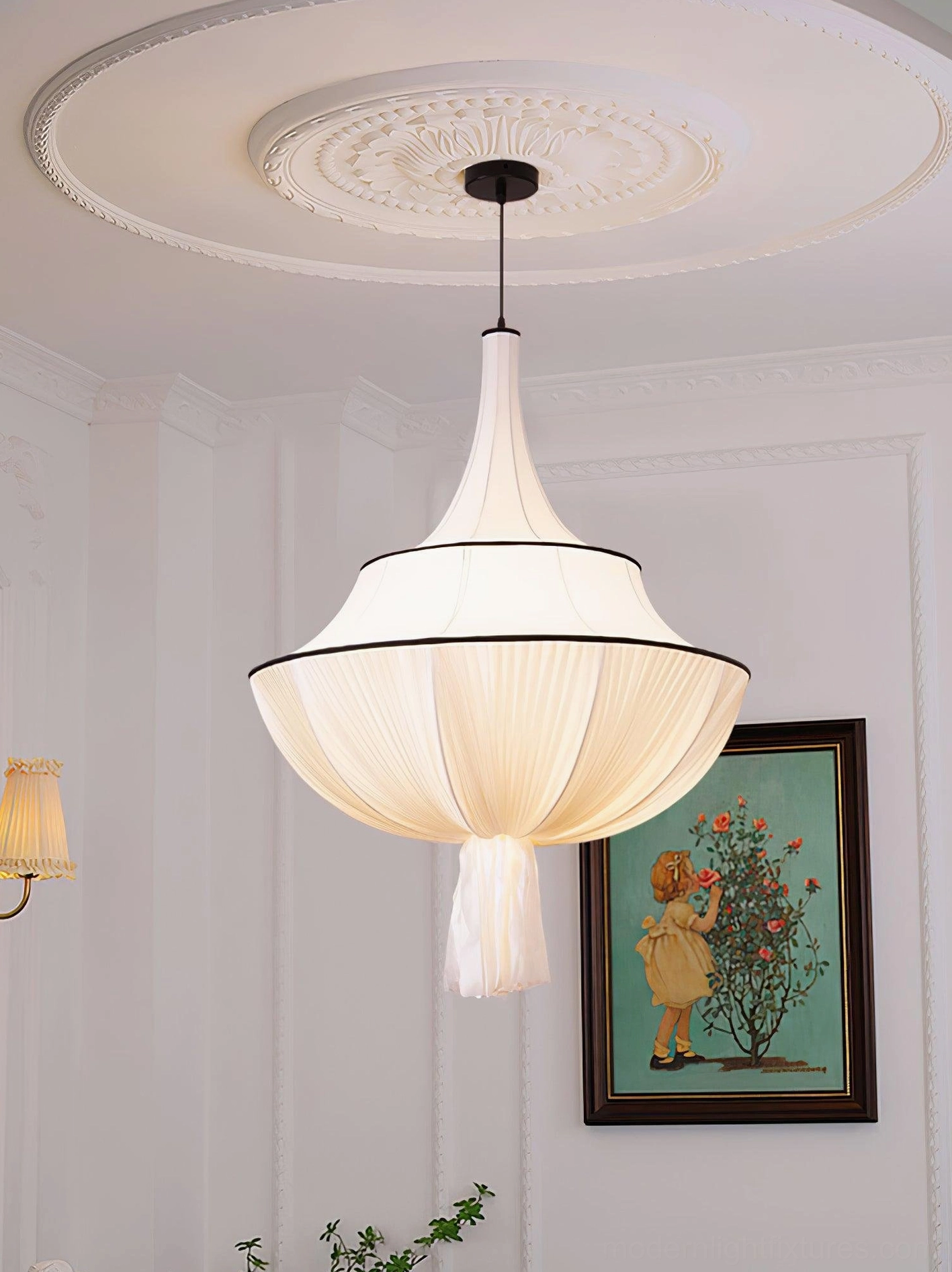 Off-white pleated fabric pendant shade with black accents, tiered pagoda shape lighting design