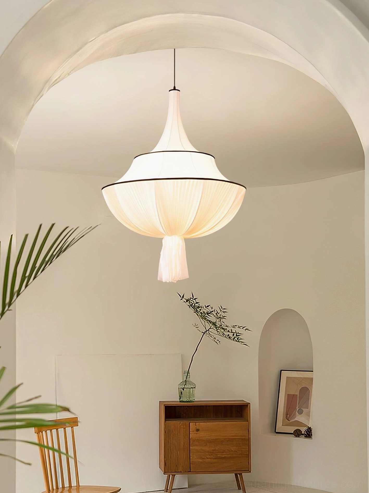Bohemian fabric pendant light in minimalist arched doorway living room, soft ambient glow