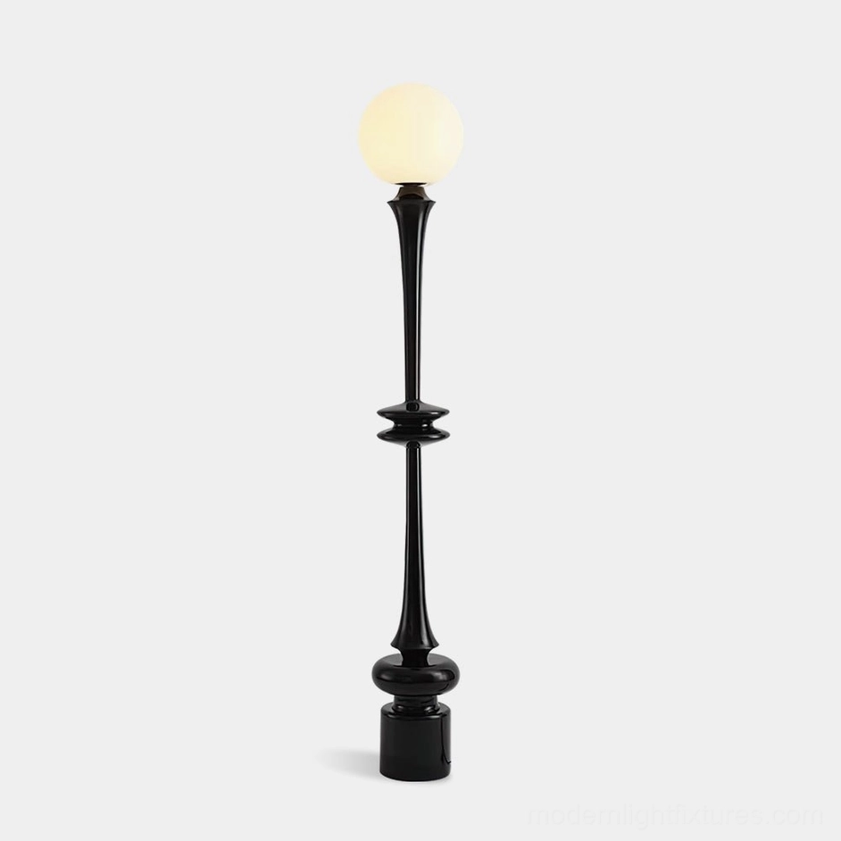 Melrose black spherical floor lamp with frosted glass orb and minimalist metal pole, frontal studio view