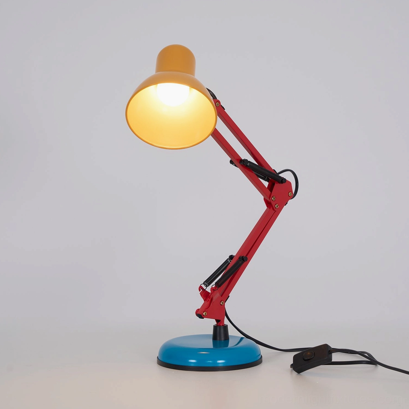 Memphis table lamp design statement piece - bold primary color modern table lamp making declarative design choice for intentional interior styling