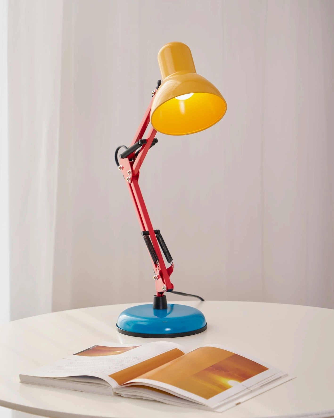 Memphis table lamp primary color design philosophy - cobalt blue red yellow triadic color scheme reflecting Memphis Group design movement principles