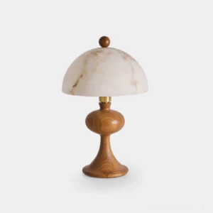 Mensy walnut wood table lamp with white faux alabaster dome shade, front studio view showing sculptural mushroom silhouette and rich wood grain